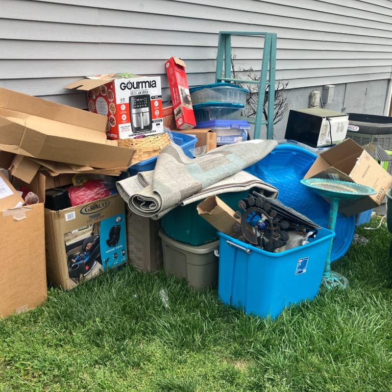 Three Brothers Hauling & Logistics junk removal crew in Durham